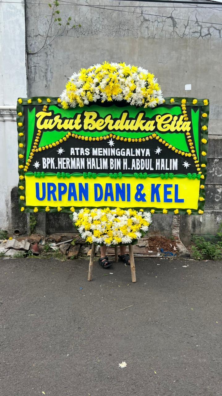 Bunga papan duka cita Cikupa Turut Berduka Cita rangkaian kuning hijau Cassiopeia Florist